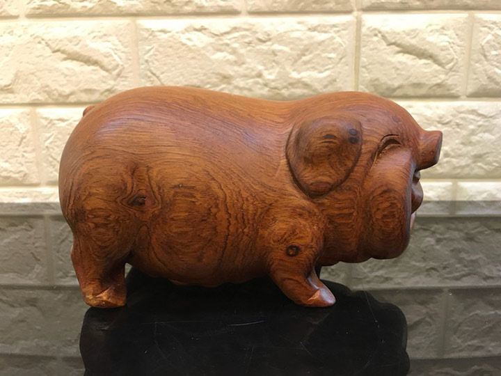 Tìm hiểu ý nghĩa tượng lợn gỗ phong thủy cho 2019 năm lợn vàng?-2