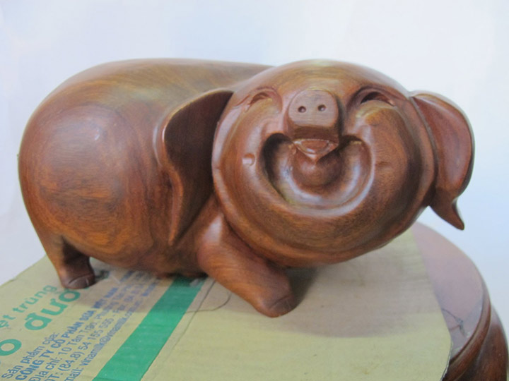 Tìm hiểu ý nghĩa tượng lợn gỗ phong thủy cho 2019 năm lợn vàng?-4